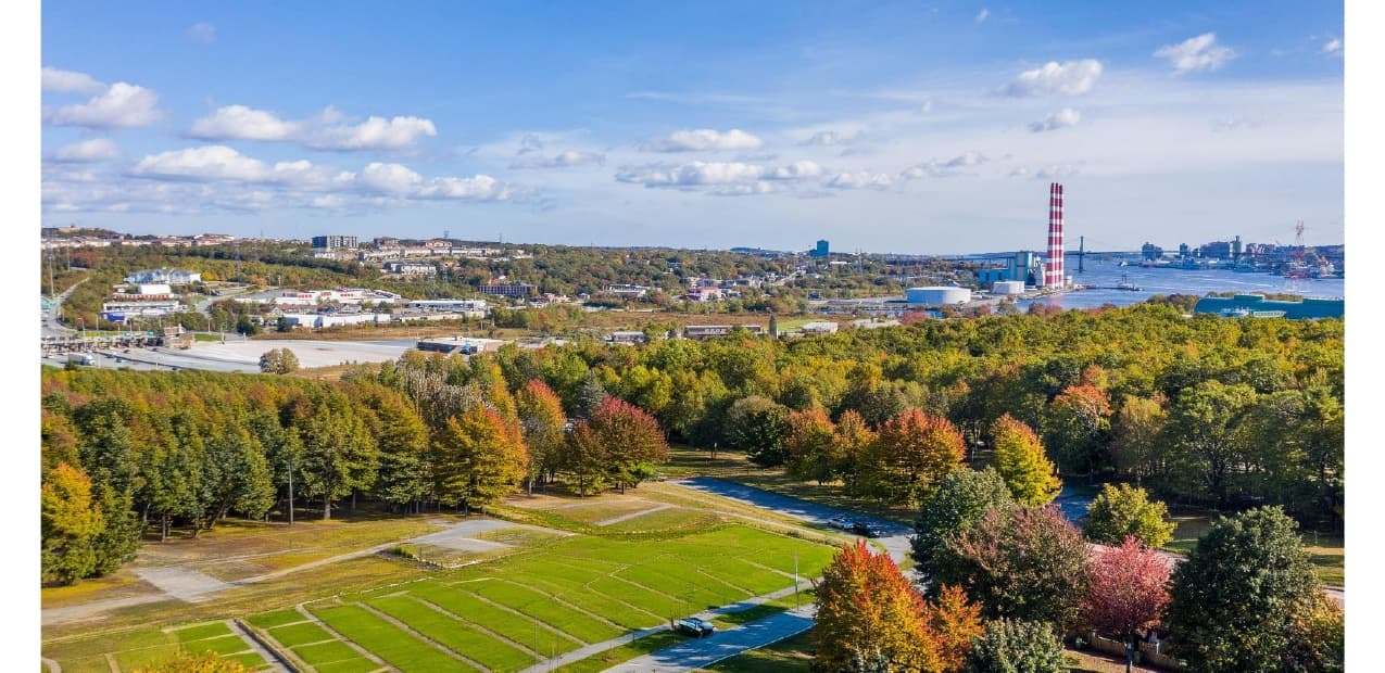 Toward the Atlantic Ocean — Dartmouth, Halifax Harbour, MacDonald Bridge, Downtown Halifax (top right)